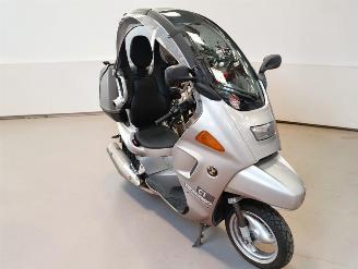 krockskadad bil motor BMW C1  2002/7