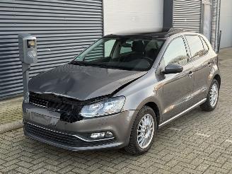 skadebil auto Volkswagen Polo 1.2 TSI Lounge Pano Cruise Clima Lage Km Stand 2015/7