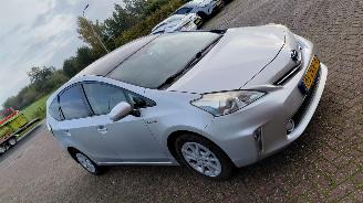 skadebil auto Toyota Prius Plus 1.8 hybrid  navi airco 2013/2