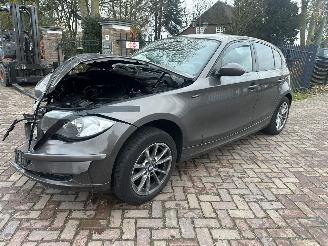 uszkodzony samochody osobowe BMW 1-serie 116i 2009/8