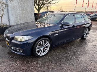 Damaged car BMW 5-serie 528i x-drive luxury 2015/6