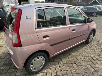 Daihatsu Cuore Cuore (L251/271/276), Hatchback, 2003 1.0 12V DVVT picture 7