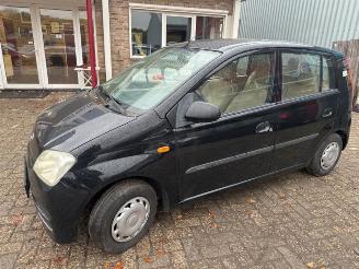 Daihatsu Cuore Cuore (L251/271/276), Hatchback, 2003 1.0 12V DVVT picture 3