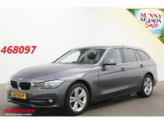 Schadeauto BMW 3-serie Touring 318i WASSER Sport Navi Clima Cruise SHZ 2015/12