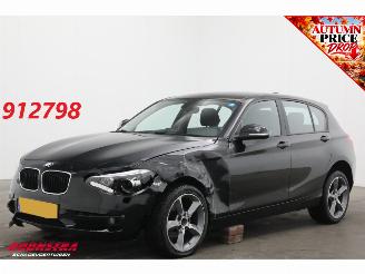 damaged passenger cars BMW 1-serie 116i Business Cruise Navi Airco SHZ PDC 2015/2