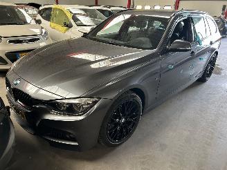 damaged passenger cars BMW 3-serie 320i  Automaat Touring  M Pakket 2019/4