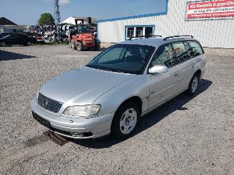 Salvage car Opel Omega B 2.2 16V Zilver Z147 Onderdelen Y22XE Motor 2000/10