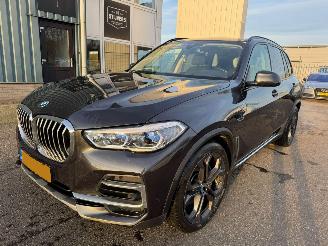 Vaurioauto  passenger cars BMW X5 xDrive45e AUTOMAAT Executive BJ 2021 122.333 KM 2021/11