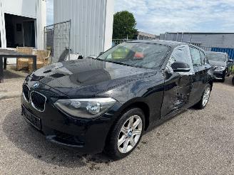 damaged passenger cars BMW 1-serie 116i AUTOMAAT 2013/1