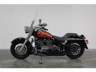 Vaurioauto  motor cycles Harley-Davidson  FLSTSCI Springer 2006