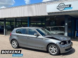 damaged passenger cars BMW 1-serie 116d Corporate Airco Parkeersensoren 5-Deurs 2010/2