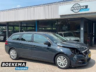 Voiture accidenté Peugeot 308 SW 1.2 PureTech Blue Lease Navigatie Climate Cruise 2019/7