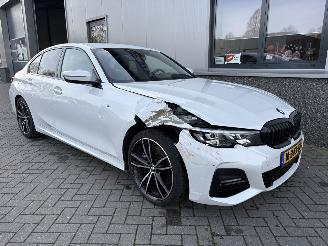 Damaged car BMW 3-serie 330i M-Pakket High Executive Automaat 2019/7