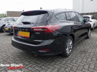 Vaurioauto  passenger cars Ford Focus 1.0 EcoBoost Titanium Hybrid 2023/10
