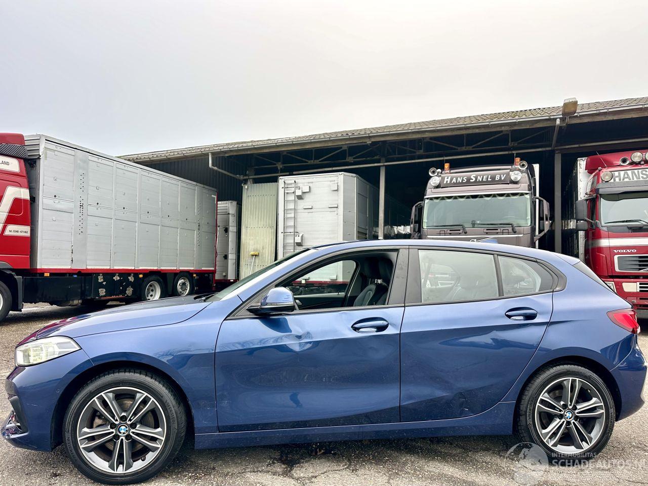 BMW 1-serie Gereserveerd 118i 136pk 7-Traps aut High Exe - nap - virtual - nav - cam - front + line + park assist - leer + stoelverw - sfeerverl