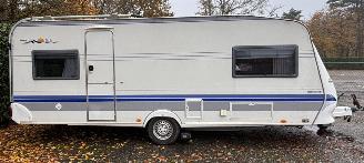 skadebil caravan Hobby  Exclusive 560 UL Enkele bedden+Mover+Voortent 2004/2