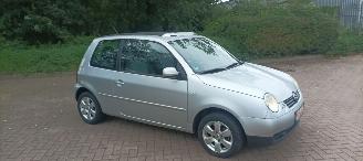 škoda osobní automobily Volkswagen Lupo Cambridge Edition 1.4-Mpi 1e eigenaar (1945) Elektrische ramen Schuifdak centrale vergrendeling Leren stuurwiel 14 inch Cambridge velgen 2003/2