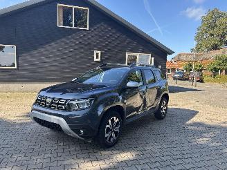skadebil auto Dacia Duster DACIA DUSTER 1.3 PRESTIGE 130 PK NAVI CLIMA CAMERA LED KEYLESS B.J 2022 2022/6