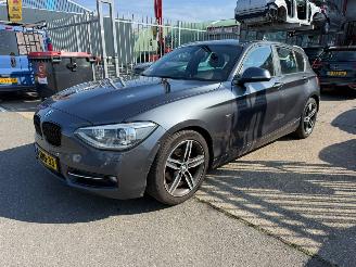 Unfallwagen BMW 1-serie 116D EDE HIGH EXECUTIVE 2014/1