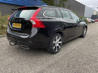 damaged passenger cars Volvo V-60 2.4 D plug in hybrid 2013/12