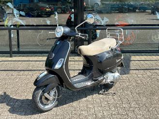 skadebil motor Vespa  LX 125 4T 2010/5