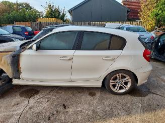 skadebil caravan BMW 1-serie 118 i 2009/6